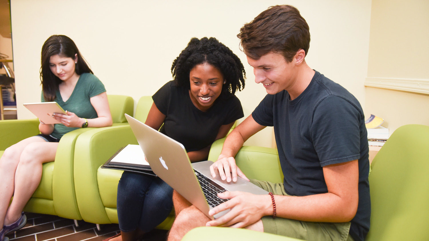 students working on laptops