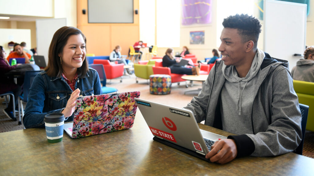 Students collaborate in Riddick Hall.