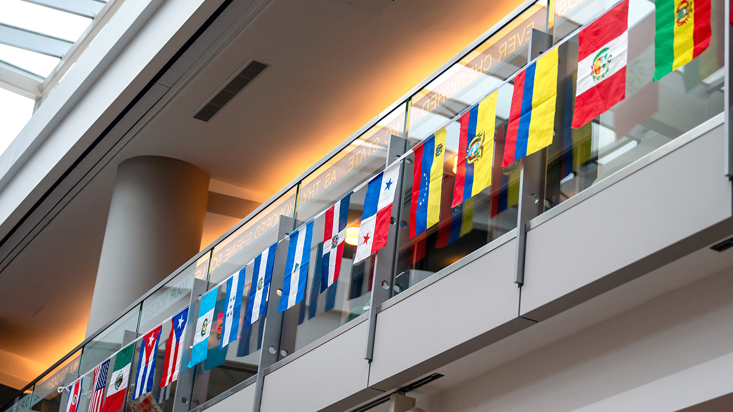 International flags line one side of the Talley Student Union